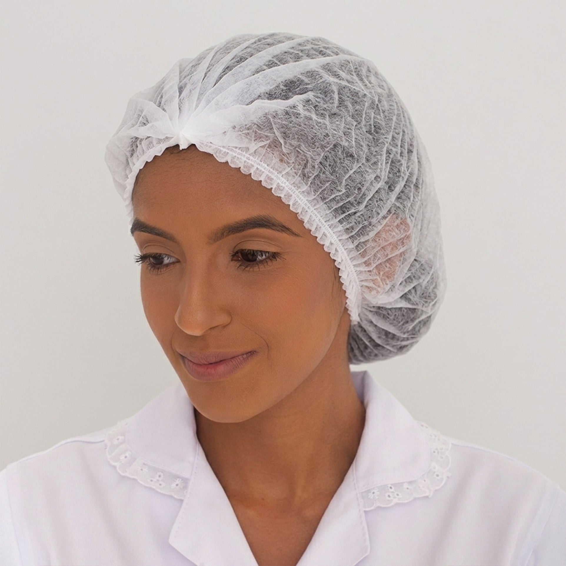 Kit 100 Toucas Descartáveis TNT